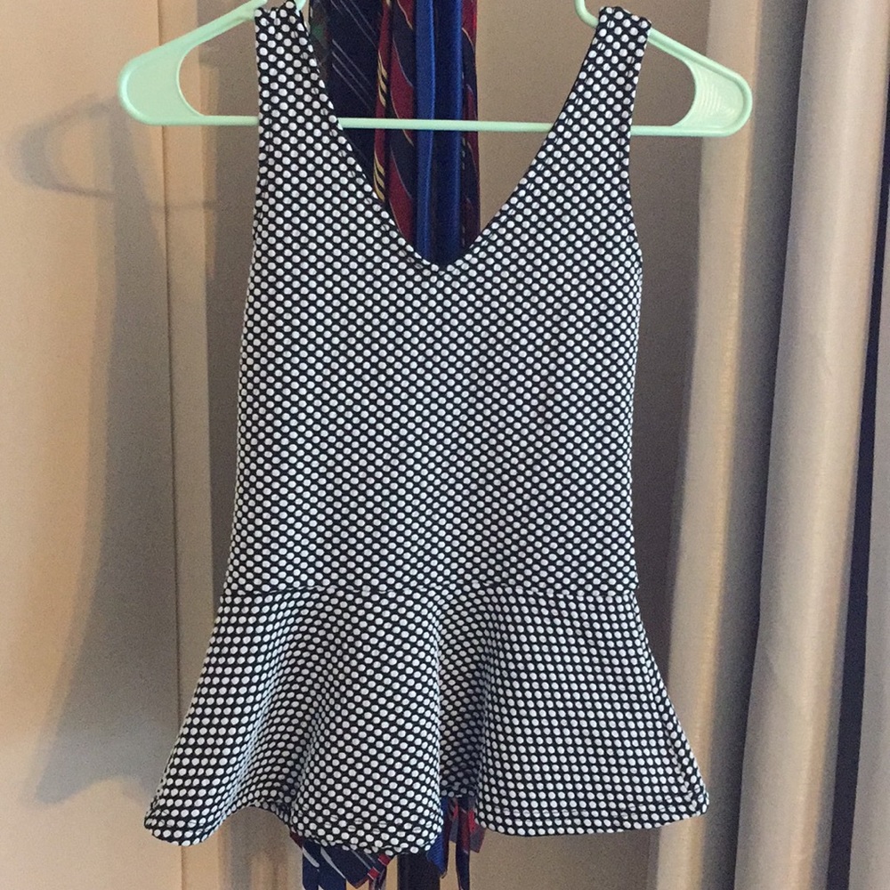 Peplum black and white top